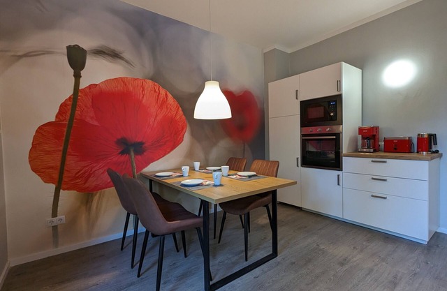 Holiday Apartment "Goldgrube - Erdgeschoss" with Private Terrace, Shared Garden & Wi-Fi