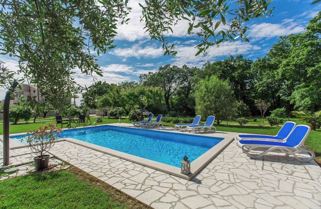 Holiday apartment with pool and air conditioning