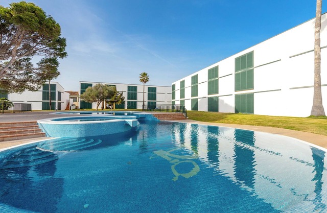 Holiday Home 'Cala´n Bosch 1a Planta' with Shared Pool, Shared Garden and Air Conditioning