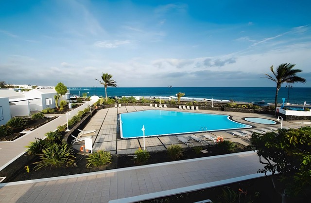 Holiday Home 'Caleta Campos Bungalows' with Sea View, Shared Pool and Wi-Fi