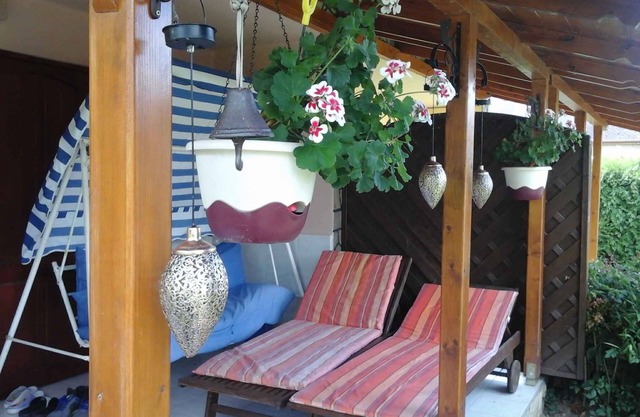 Holiday home on the shore with jetty, air conditioning and WiFi
