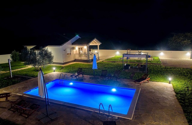 Holiday home Relax with swimming pool