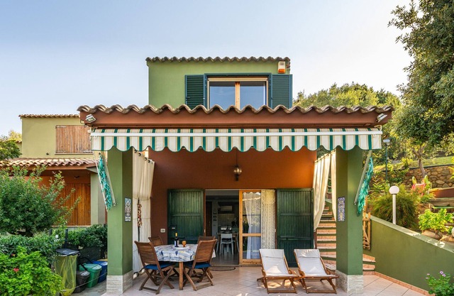 Holiday Home "Villetta Anna a Porto Sa Ruxi" with Sea View, Shared Pool & Wi-Fi