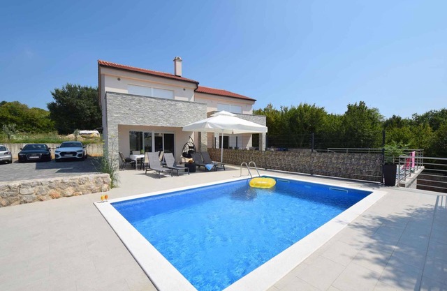 Holiday home with a pool and three bedrooms