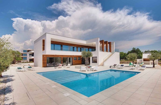 Holiday home with outdoor pool, Finnish sauna and games room