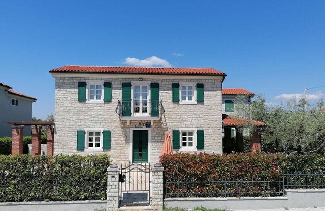 Holiday house Villa Nika with an outdoor whirlpool