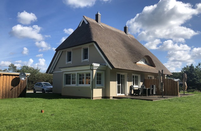 Holiday living under thatched roof - 4 bedrooms, 2 bathrooms, large garden and terrace