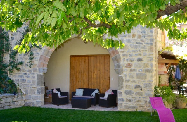 Holidays in Lagrasse. Stunning medieval apartment set in walled garden with pool