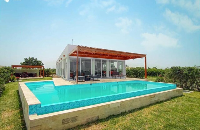 HOP BUZIOS exclusiva oasis y playa en Chincha