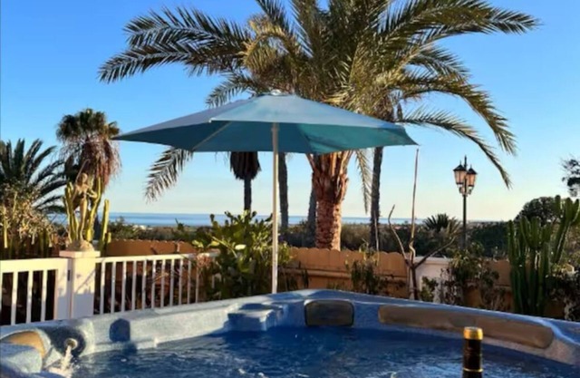 Hot tube with views to the sea and golf course