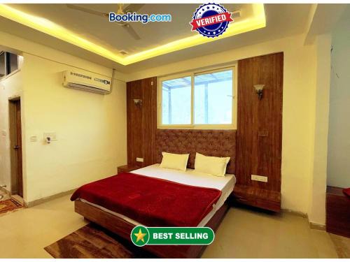 Hotel Radha Palace ! Just beside ISCKON temple and Close to Prem mandir ! Fully Air Conditioned Family rooms with Lift and Parking Availability