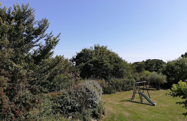 House with large garden in the peninsula of Rhyus