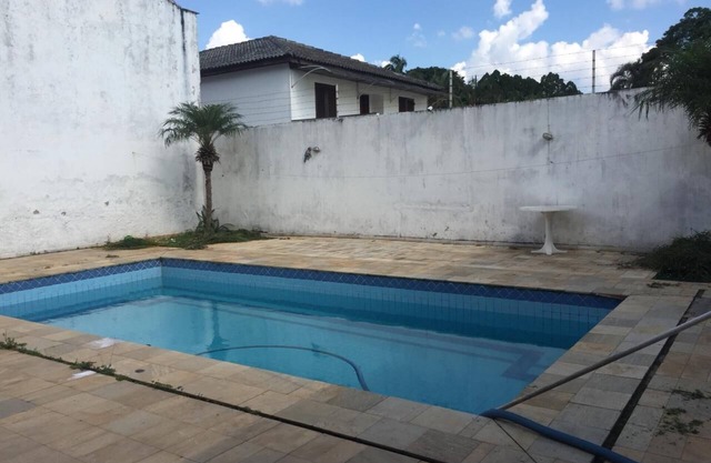 House with pool in residential neighborhood