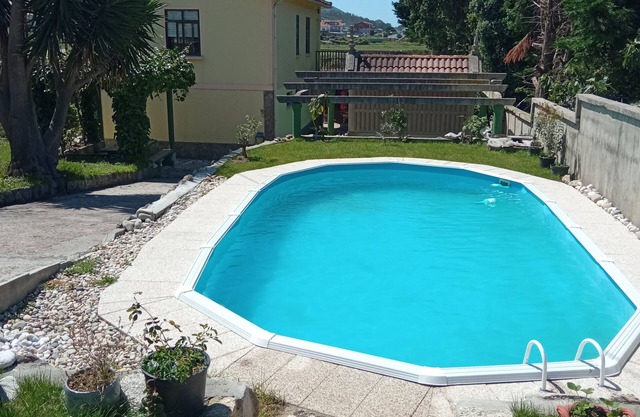 House with swimming pool next to the sea in Viladesuso