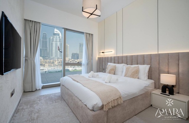 Iconic Views | Daily Cleaning | Hotel-Grade Stay | EMAAR Grande