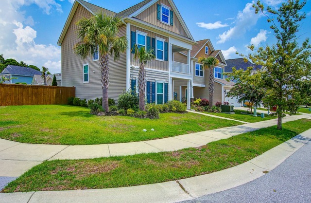 Inviting dog-friendly home with full kitchen, balcony, central AC, & W/D
