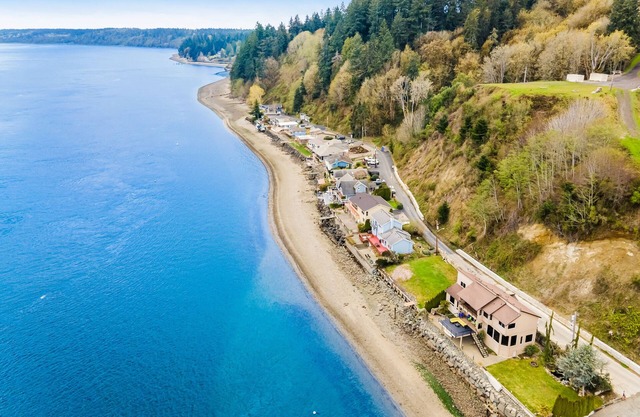 Inviting waterfront home with kayaks, dock, firepit, central AC, & W/D