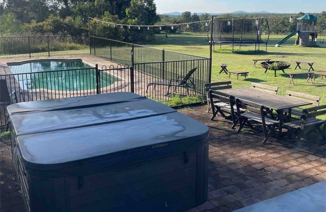 Ironstone Homestead family private pool and hot spa open fire games room