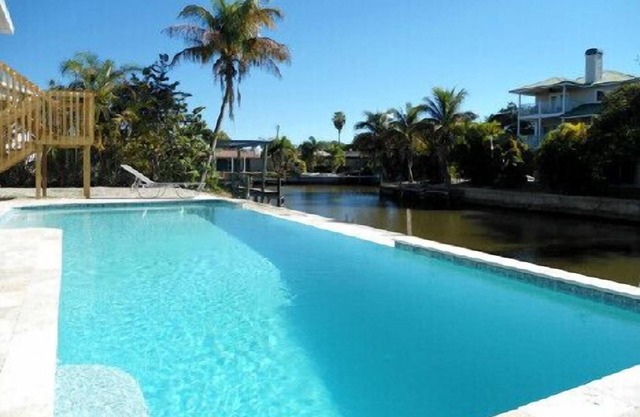 Island Villa with 33 Foot Infinity Pool, Dock and Boat Access, Dolphin Visits