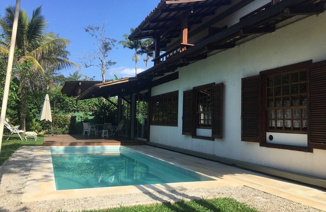 Itamambuca condo 15 people 5 suites 11985367259 pool foot in the sand