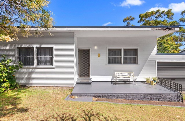 Jen's Place. a charming vintage cottage that embodies the essence of classic coastal living.