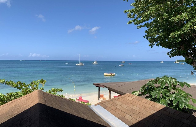 King Suite at Oceanview Resort in Jamaica - Enjoy 7 Miles Of White Sand Beach! 1 Bedroom Villa by RedAwning