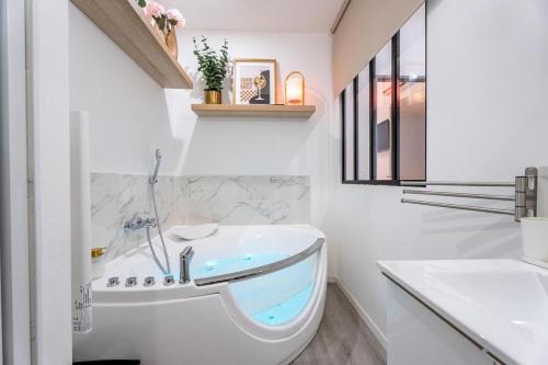L'ARCADE SECRETE Appartement climatisé, Jacuzzi, Borne d'arcade Bordeaux centre