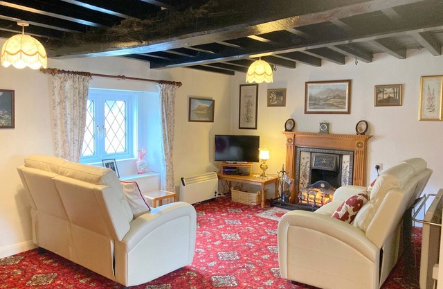 Lake District oak-beamed cottage.Pet welcome. Summer heated outdoor pool.