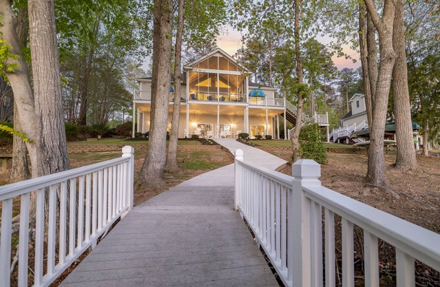 Lake Gaston waterfront home! Our pontoon boat is free for our guests!