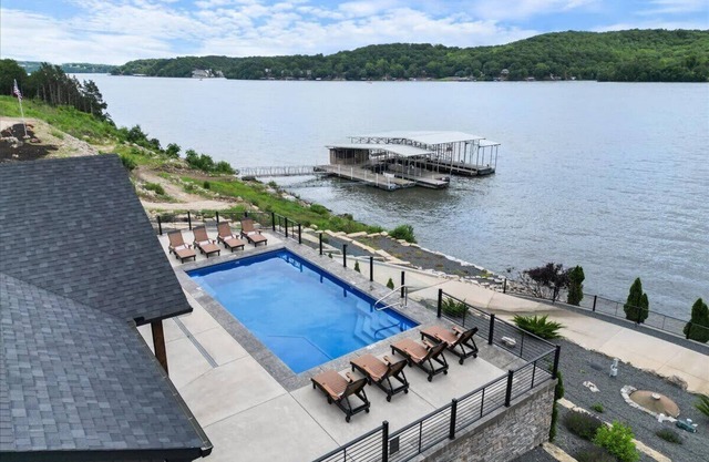 Lakefront Home with Private Pool and Dock! Close to the Cave with Huge Views!