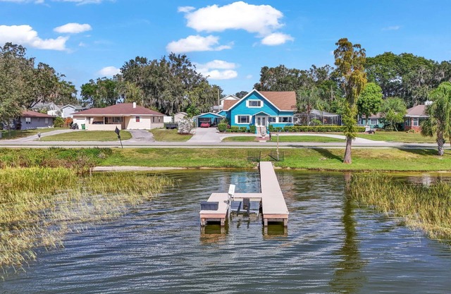 Lakefront Retreat at 6BR Escape w/Heated Pool | Private Dock | Game Room | Kayaks | Deck | Perfect