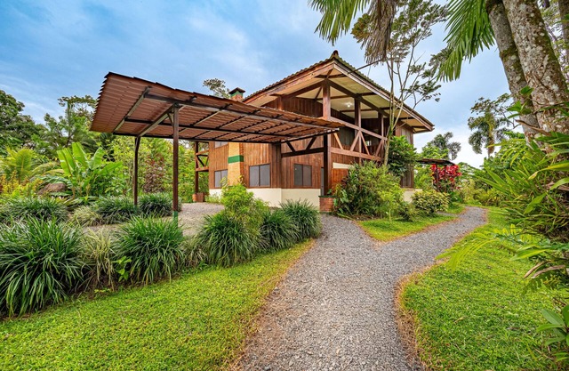 Large Home Set Into Lush Landscape with Private Pool & Gorgeous Deck Area