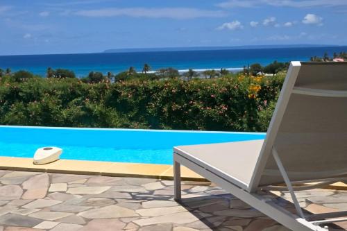 Les villas "Fenêtres Sur Plage" - Villas Créoles de charme , vue exceptionnelle face mer et plage & piscines privées à débordement