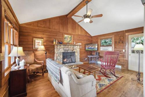 Log cabin on peaceful river