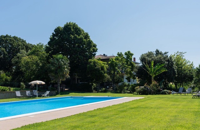 Lovely apartment in villa for 6 guests with WIFI, pool, TV, terrace and parking