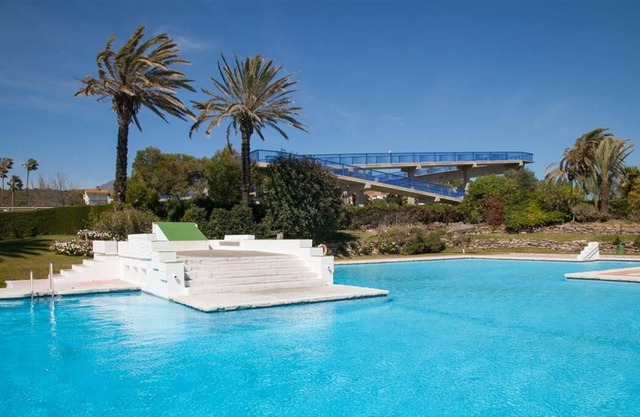 Lovely townhouse by the sea with pool and Wifi, Close to beach, gardens, pool and town