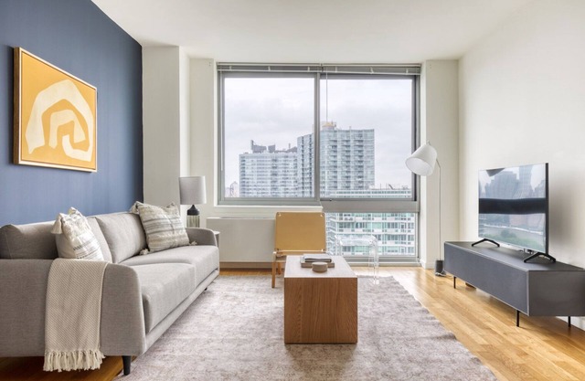 Luxe LIC 1BR w/W/D, Elevator & Doorman, near East River, by Blueground