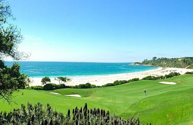 LUXURIOUS DESIGNER CONDO, WALK TO THE BEACH!