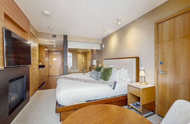 Luxurious hotel room with shared hot tub, on site spa, and ski in/ski out