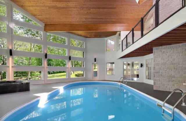 Luxurious living| Heated Pool| Hot Tub| Backyard Pond all on 14 acres!
