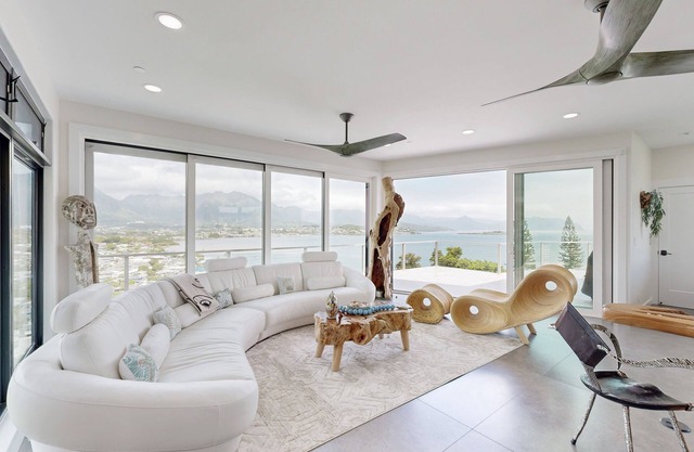 Luxurious modern home with multiple lanais, private elevator & views throughout
