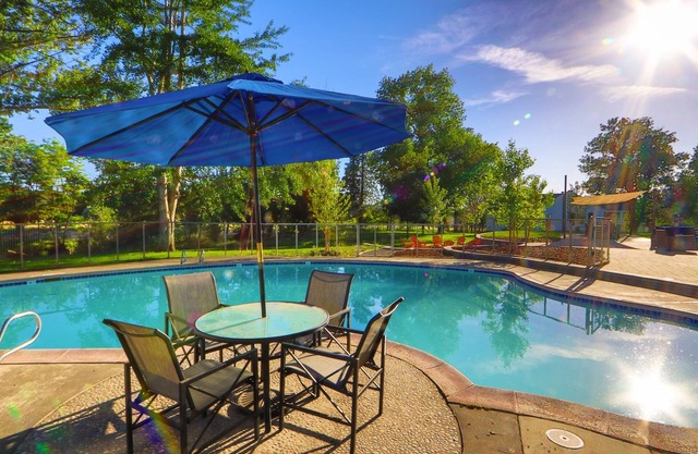 Luxurious, park like setting w/heated pool!