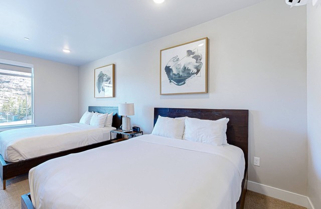 Luxurious resort studio with pool, hot tub, ski shuttle + rolling foothill views