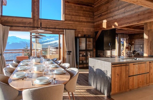 Luxury 10 person, 5 bedroom chalet with hot tub, sauna and steam room.