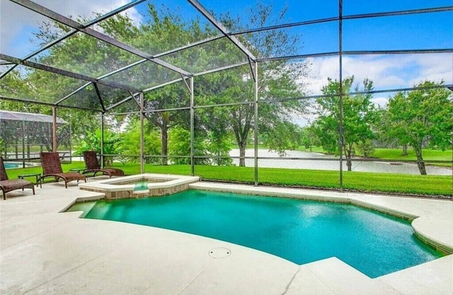 Luxury 5BR Waterfront Retreat w/Pool, Hot Tub & Game Room Near Disney