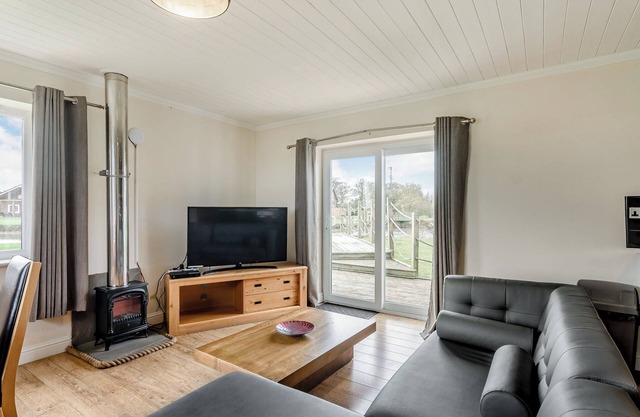 Luxury and contemporary retreat with a spacious open plan kitchen/lounge area.
