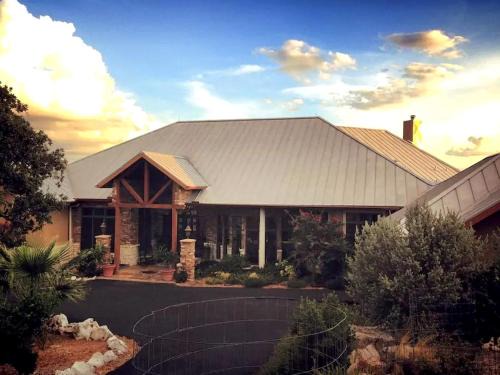 Luxury Four-Bedroom Cabin Rental with a Fireplace in New Braunfels, Texas