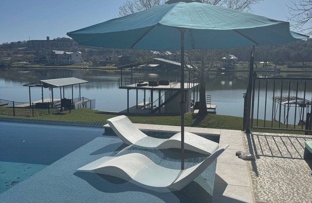 Luxury Lakefront Living in Marble Falls: Pool, Private Dock & Endless Views!