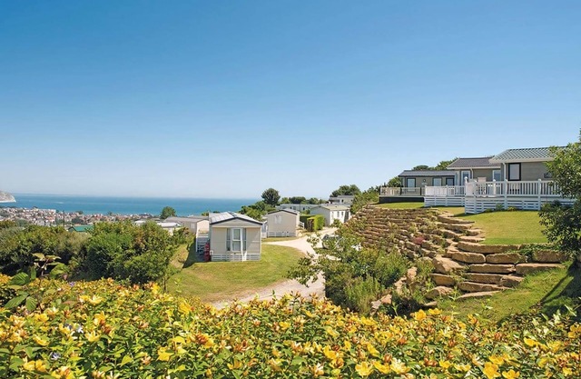 Luxury lodge with one double with en suite shower and one twin.