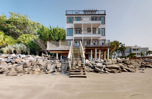 Luxury Oceanfront Villa with pool, firepit, & rooftop view-Walk to Pier Village!